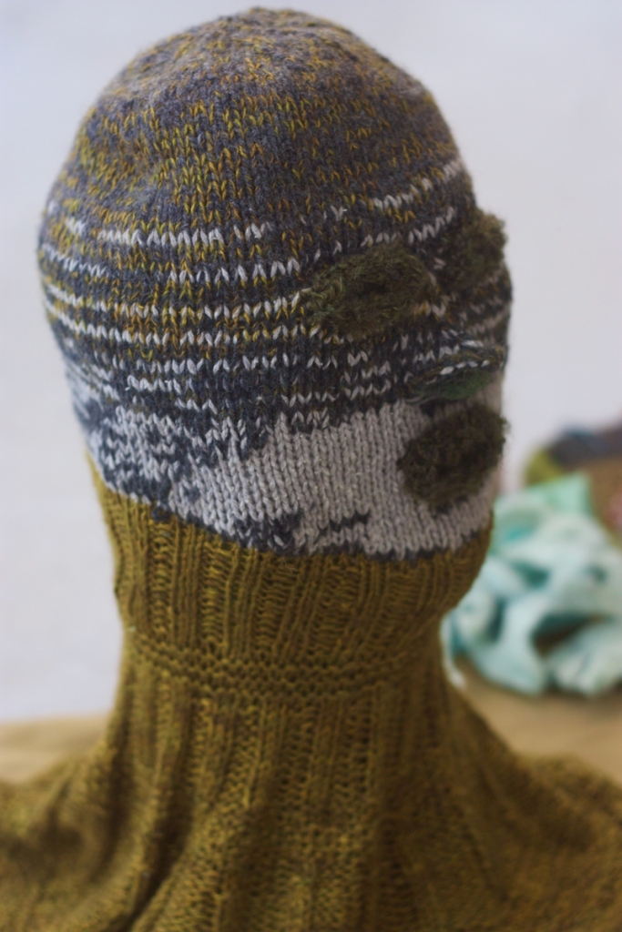 green-gold and grey knitted head